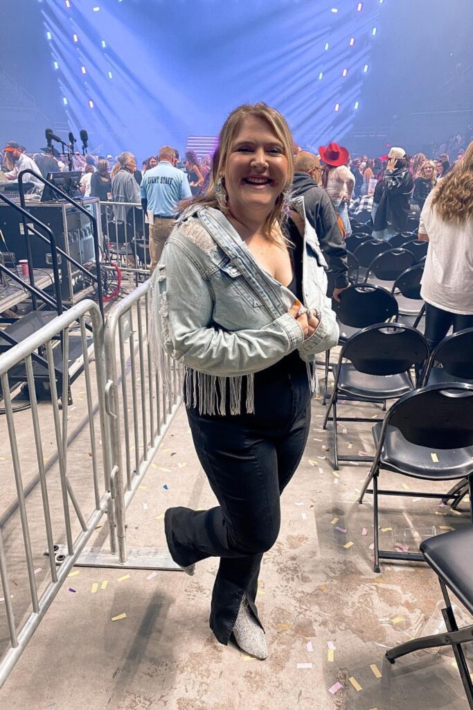 Fringe Jacket, Black Top & Ripped Jeans