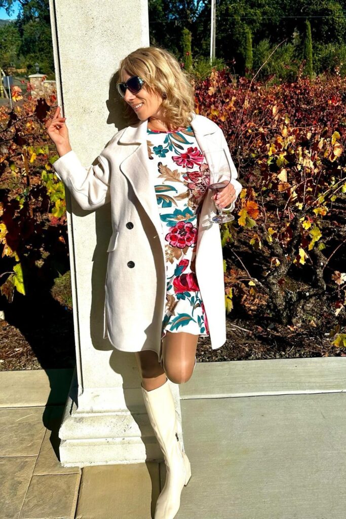 White floral dress and cream coat