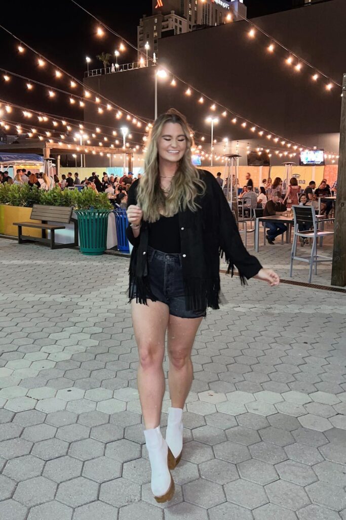 Fringe Jacket & Black Shorts with White Boots