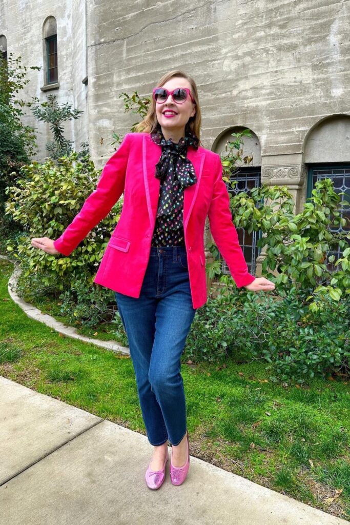 Vibrant Red Blazer with Printed Blouse and Blue Jeans