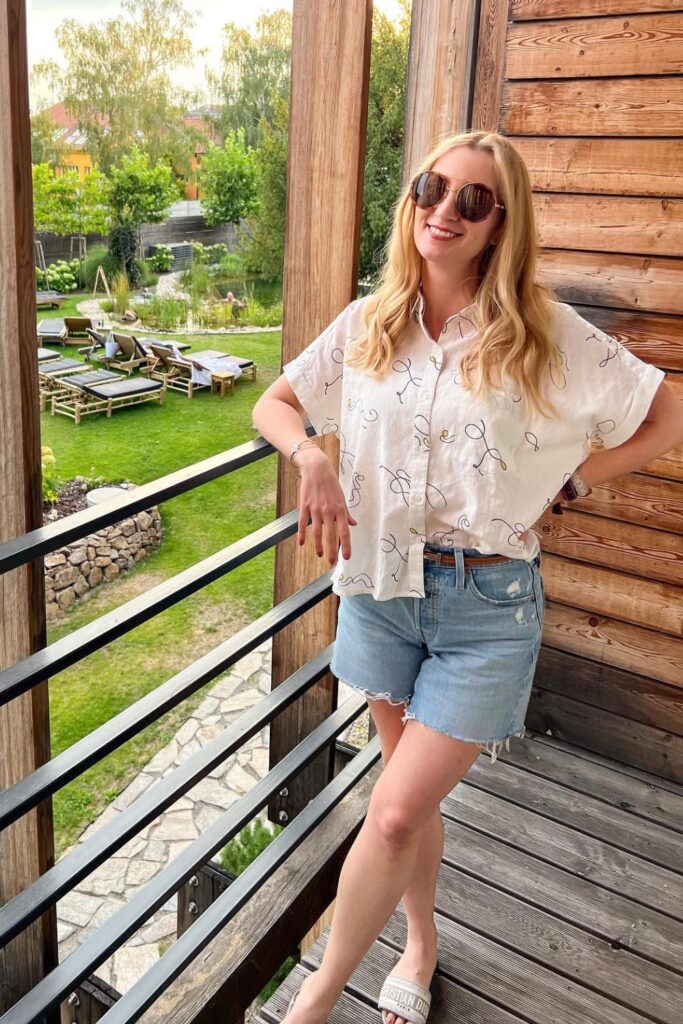 Casual Summer Outfits: 10. Printed Blouse + Denim Shorts + Sandals