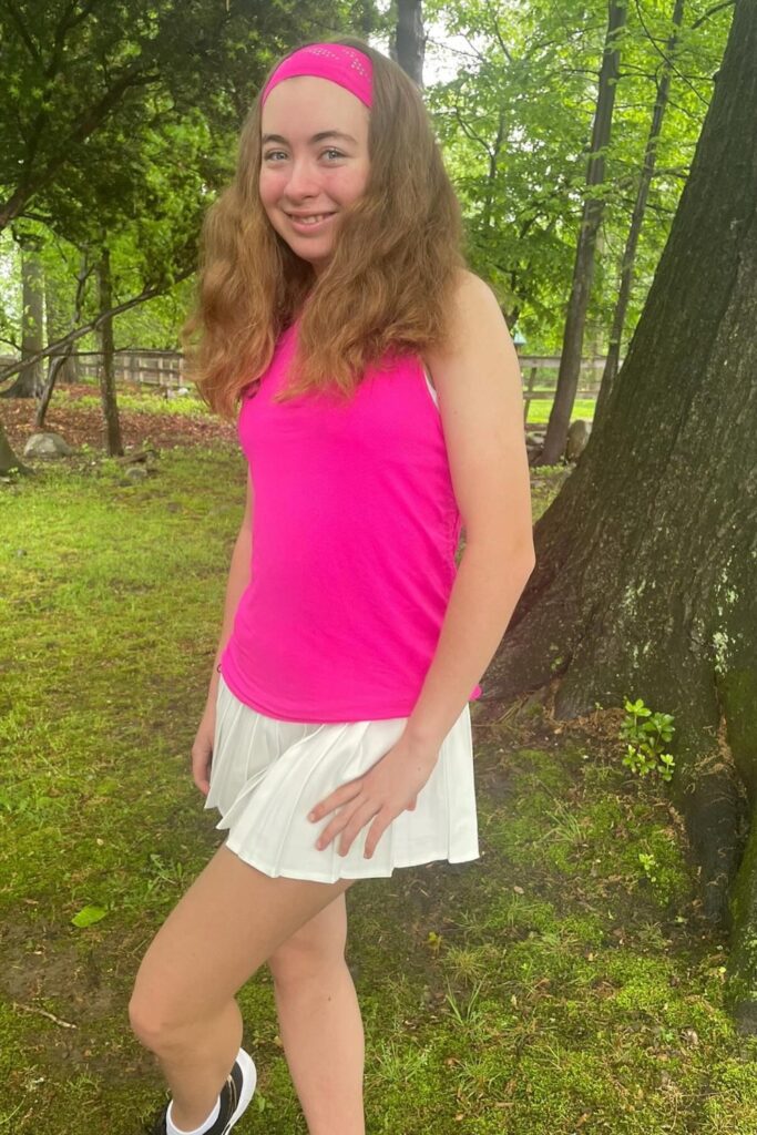 Tennis Skirt outfits: Pink Top and Cream Skirt