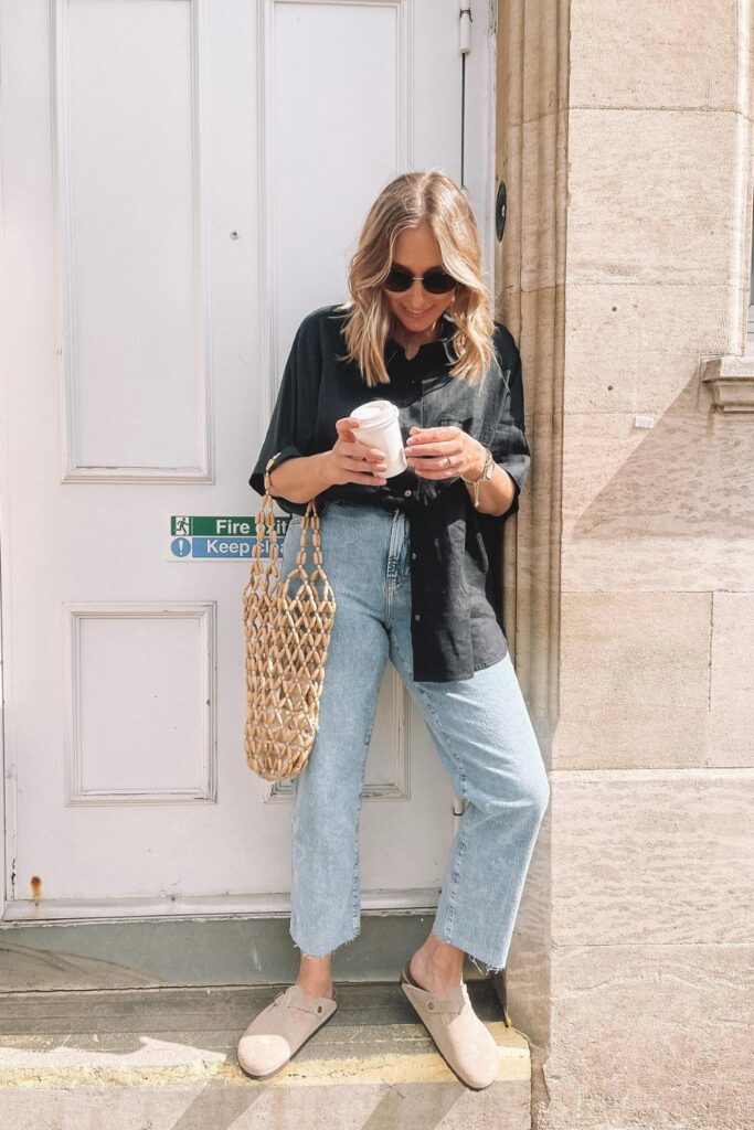 Sleek and Simple: Black Button-Up and Wide-Leg Jeans