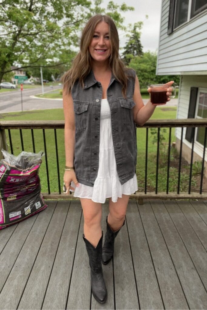 White Mini Dress with Denim Vest and Black Cowboy Boots