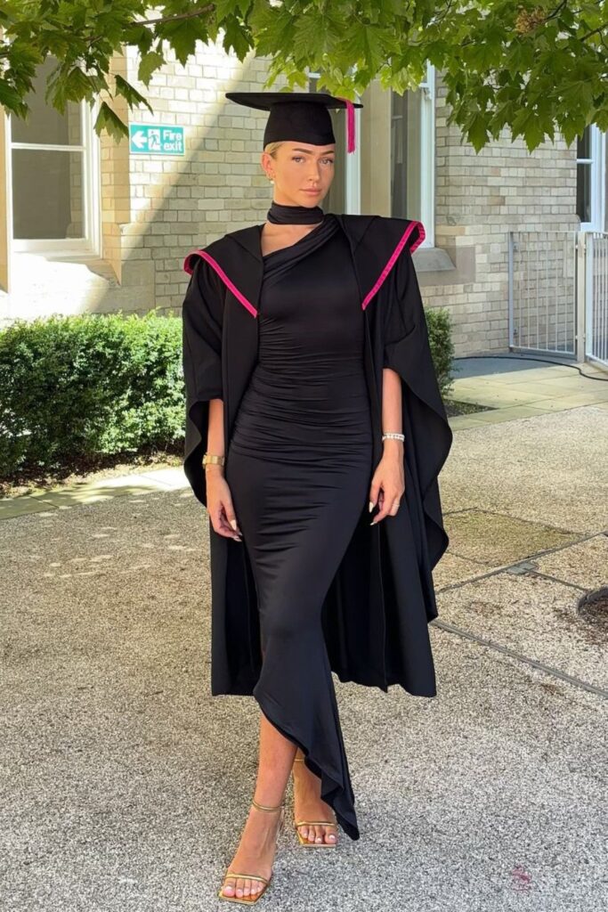 Black Academic Gown over Form-fitting Black Dress