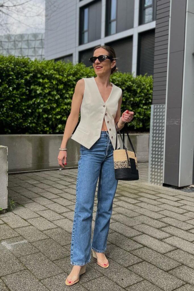 Jeans and Heels Outfit: Cream Vest, Jeans & Wedges 