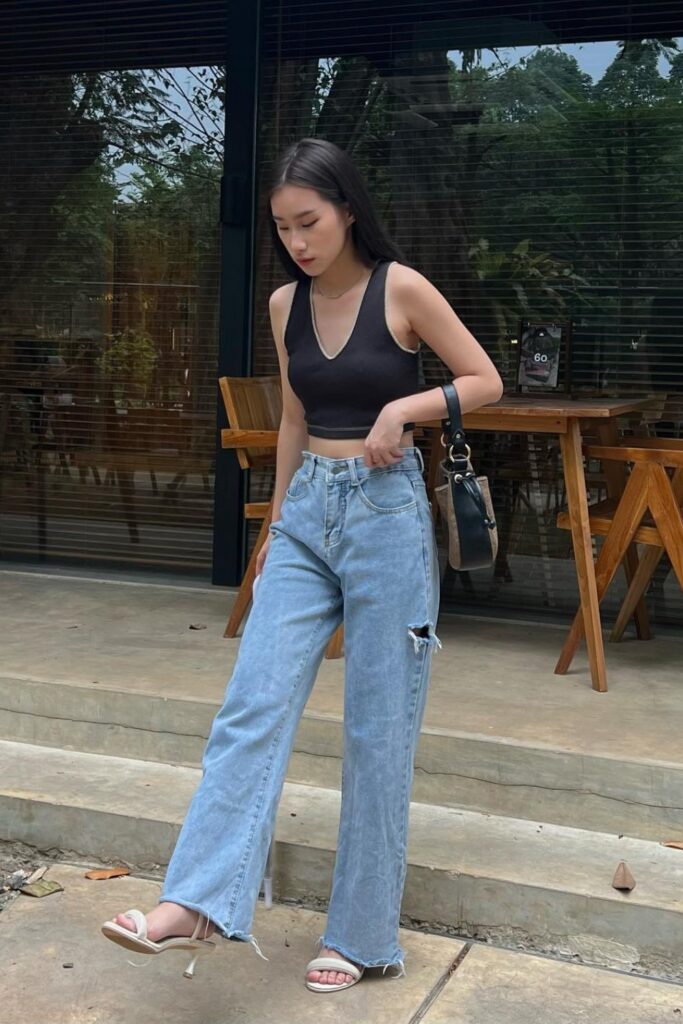 Jeans and Heels Outfit: Black Halter Top, Jeans & White Heels