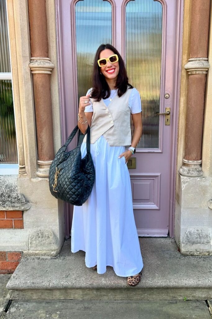 White Maxi Dress and Sleeveless Sweater Vest