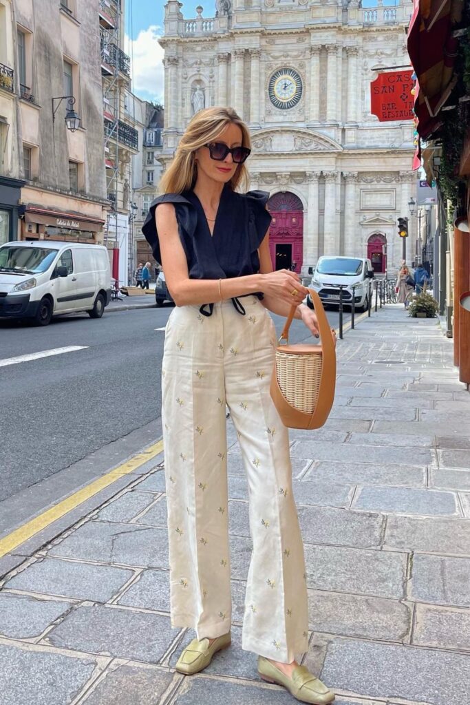 Old Money Aesthetic Outfits: Black Ruffle Top with White Linen Trousers