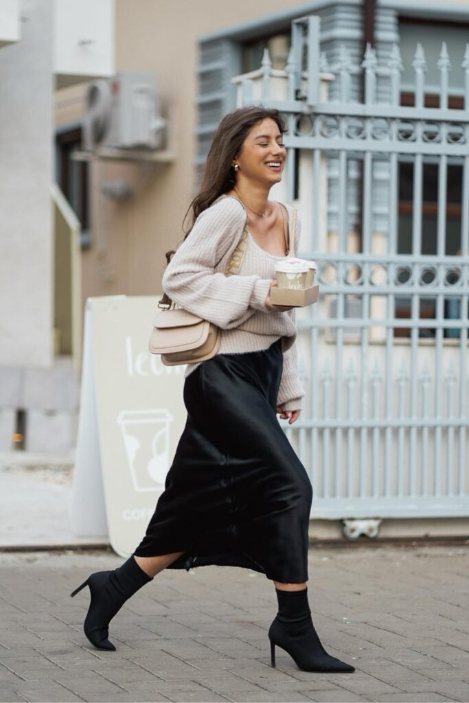 Cream Sweater and Black Satin Skirt