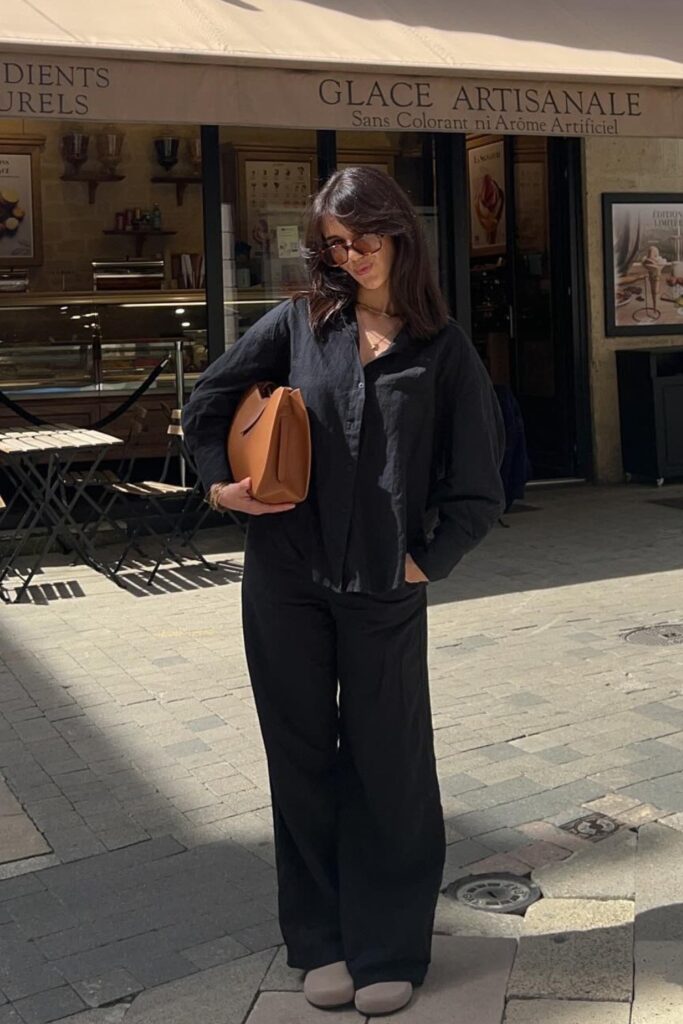 Oversized Button-Down Shirt and Tan Handbag