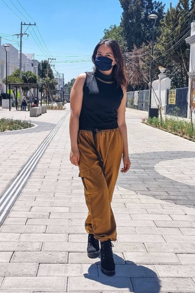 Edgy Chic: Black Top and Cargo Pants