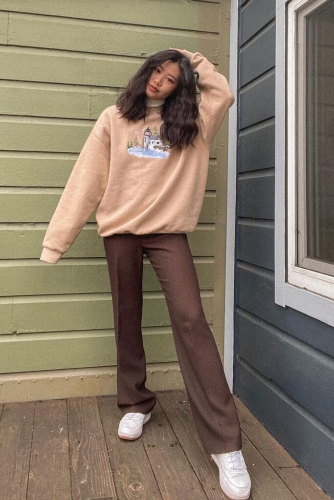 Cozy Casual: Oversized Beige Sweatshirt and Flared Pants