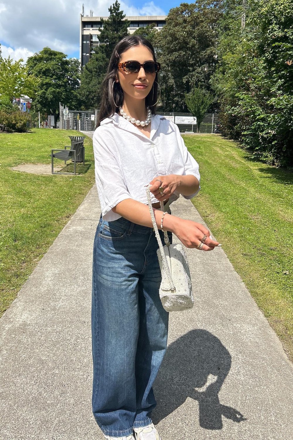 White Cropped Button Up and Blue Jeans