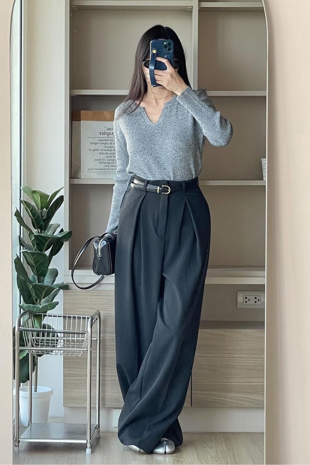 Gray Sweater and Black Trousers