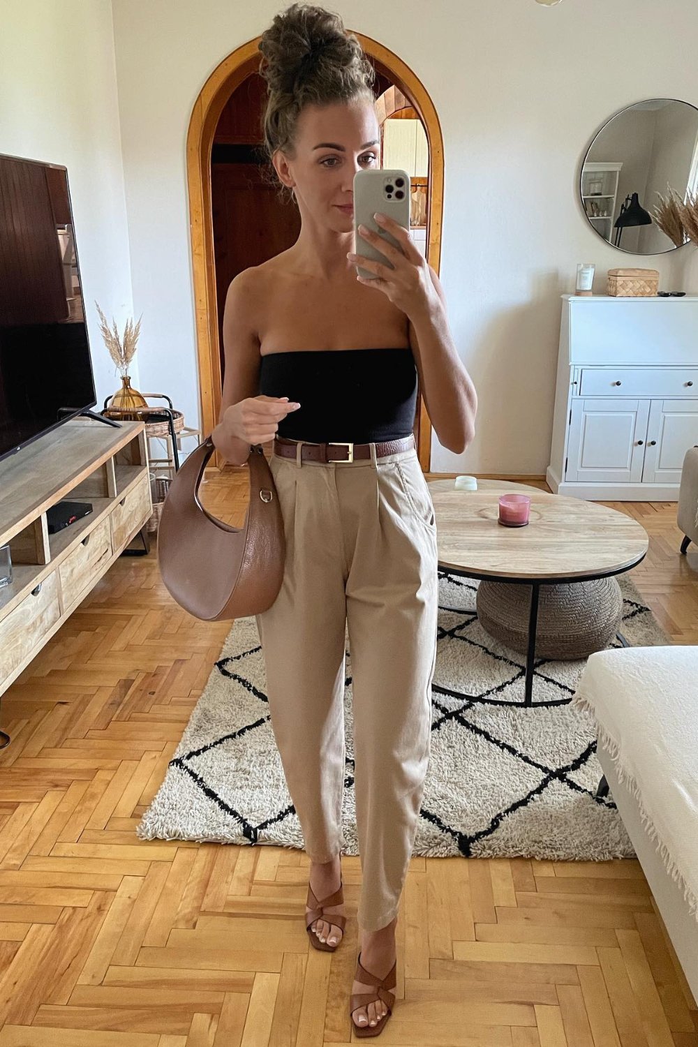 Strapless Top and Beige Trousers