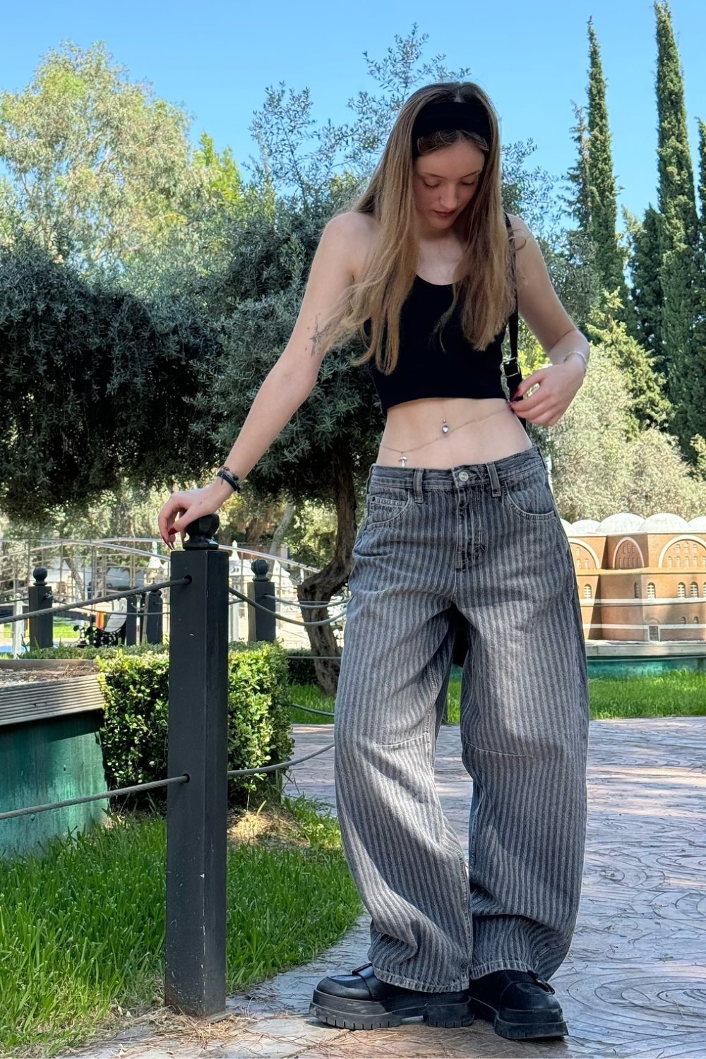 Black Crop Top and Gray Striped Jeans