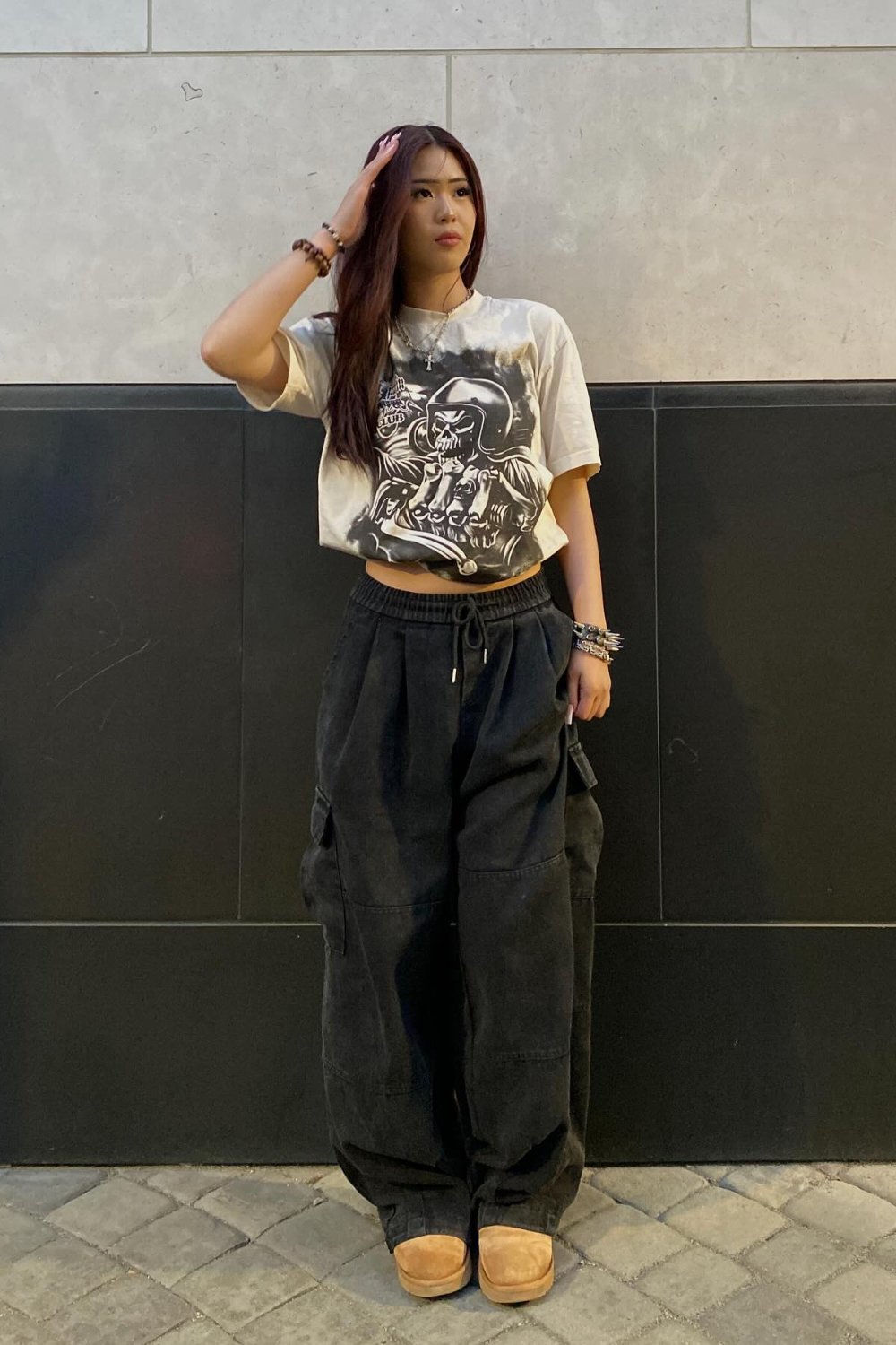 White Graphic Tee and Black Cargo Pants