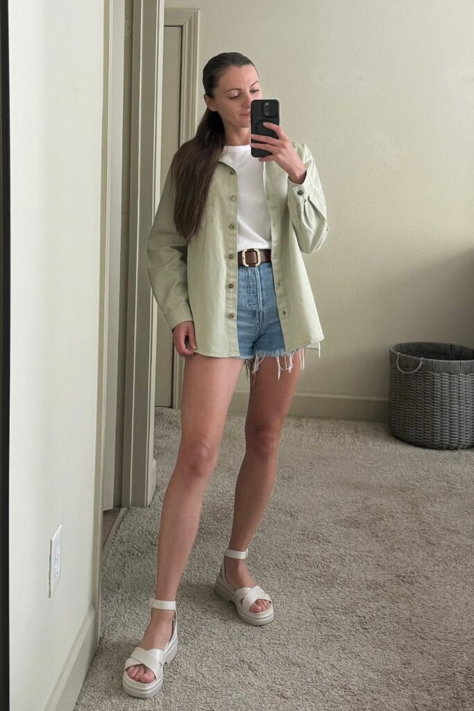 Oversized Shirt Layered Over Denim Shorts