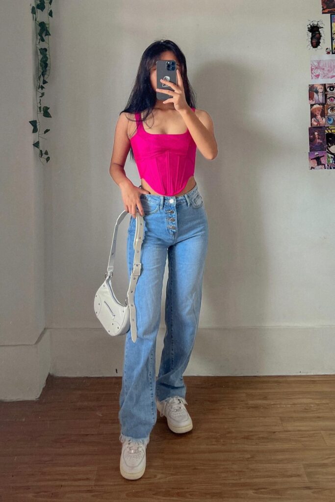 Hot Pink Corset Top and High-Waisted Jeans